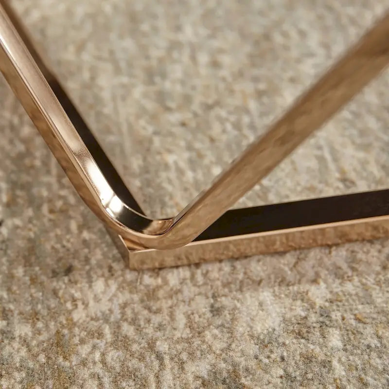 Table basse ronde moderne en similicuir marbre avec piètement géométrique doré